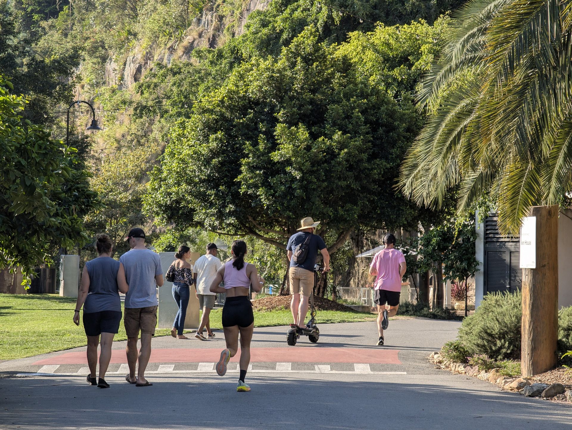 Joggers and scooters dart around each other at the leafy cliffside Howard Smith Wharves